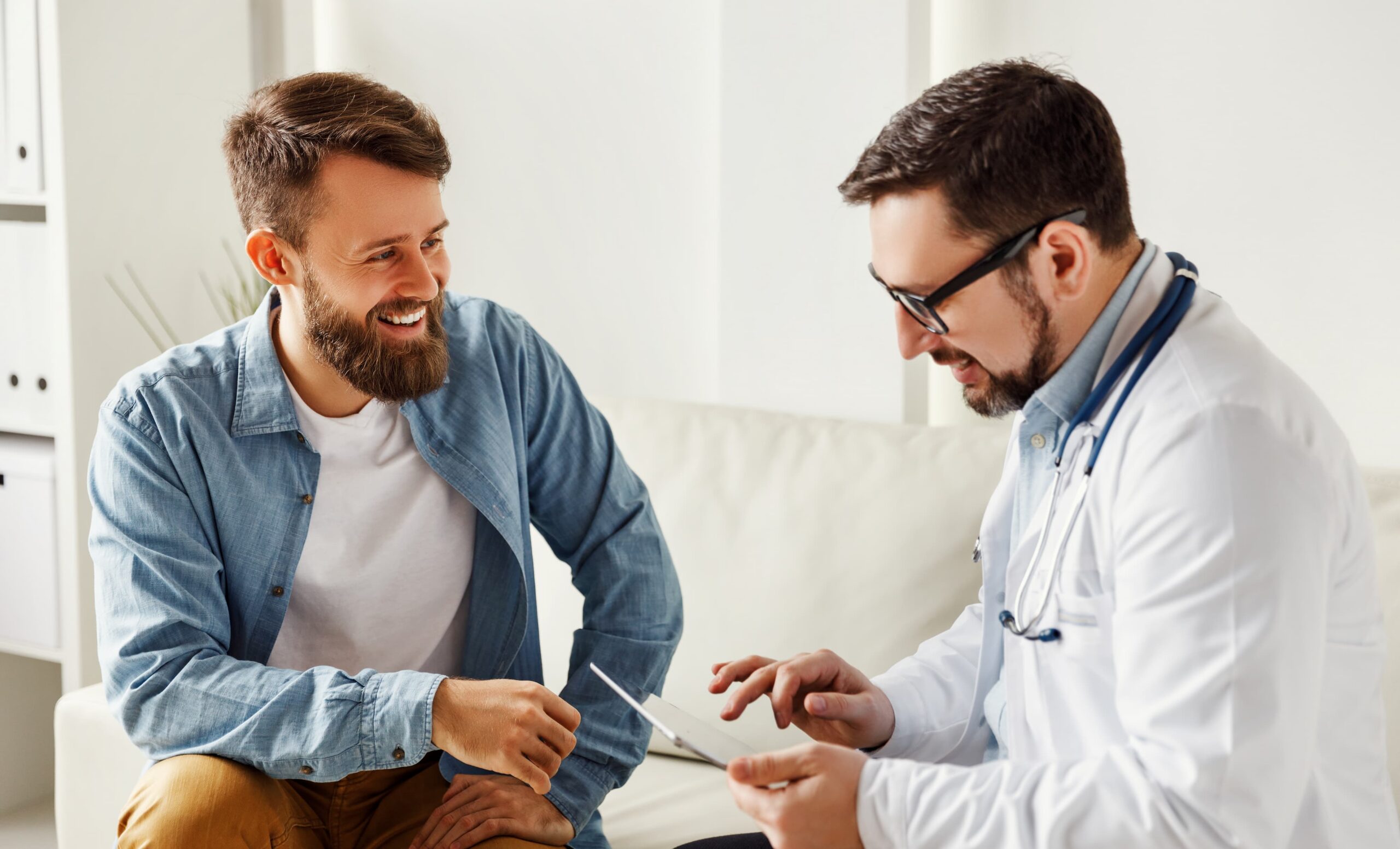 Man Learning about sperm donation from a doctor